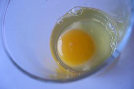 Raw egg in a cup